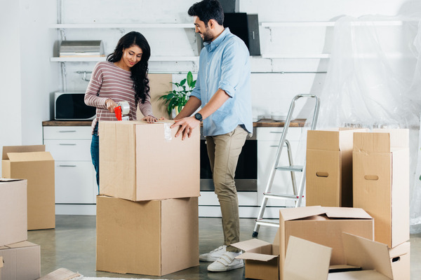 couple packs boxes while selling their brevard county home