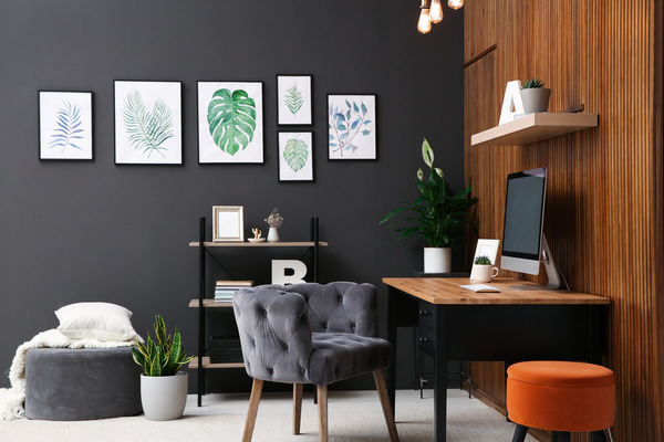 home office with grey wall, grey chair, wood accents