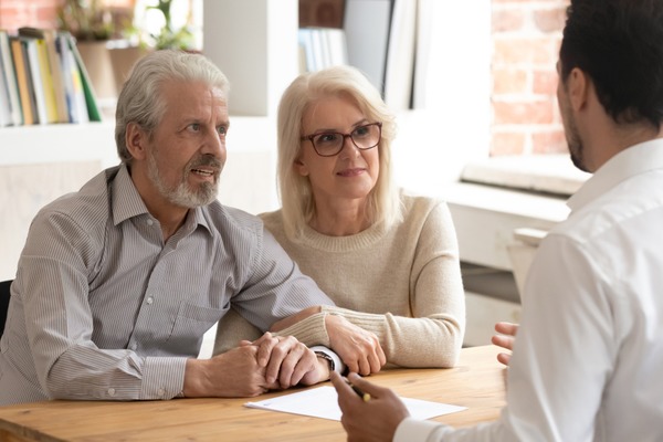 couple getting advice from realtor