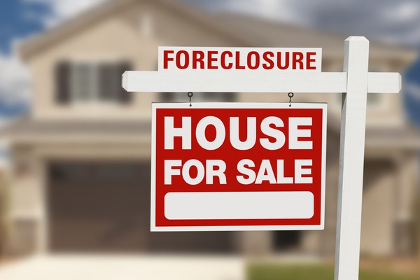 foreclosure house for sale sign