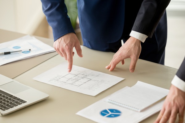 man reviewing property statistics and information