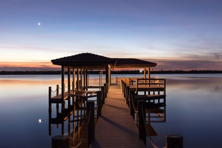 pier on river at dusk