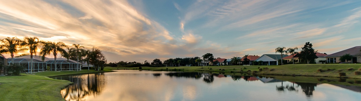 Sunseting over lake in Baytree subdivision Melbourne, FL