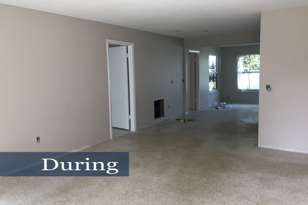 Living space during rehab shows the refinished Terrazzo, freshly painted door casings and the new wall paint color