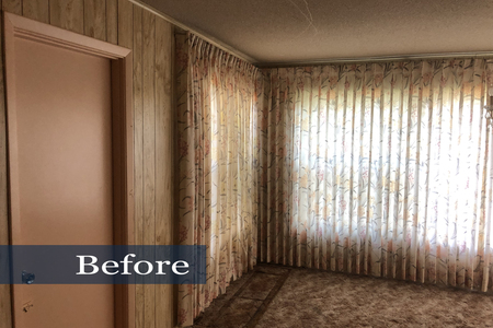 This before picture is of the dining area wall opposite to the previous shot. Floor to ceiling floral window coverings, paneling, carpet and brown painted door to laundry room.