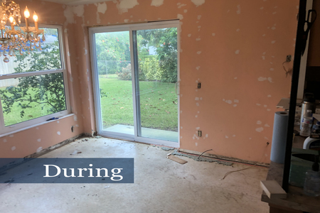 Dining area after carpet and paneling removed.  Dozens of holes left when paneling was removed had to be patched in preparation for painting.