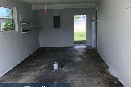 Even the garage was renovated.  All debris was removed and the walls were painted white.