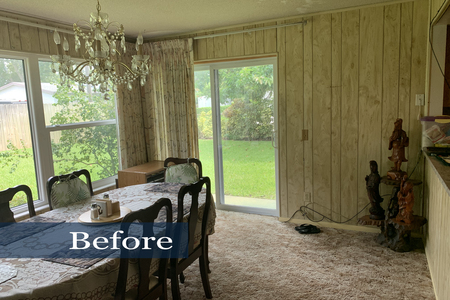 Dining area at start of project had shag carpeting, wood paneling, floor to ceiling floral drapes and dated chandelier