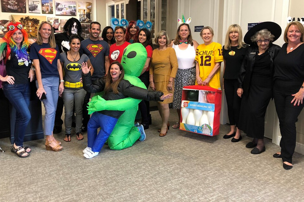 The Ellingson properties team in costumes for Halloween 2018