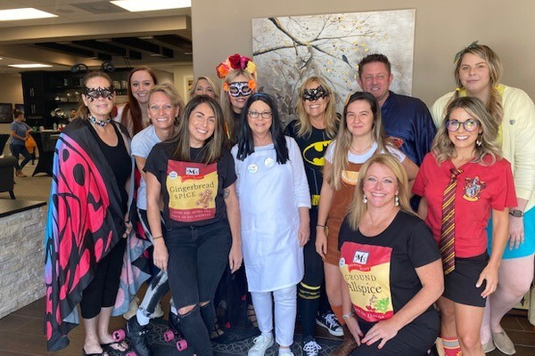 The Ellingson Properties team in costumes for Halloween 2021