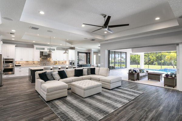 Clean lines & simple palate of browns & grays adorn the great room and outside spaces