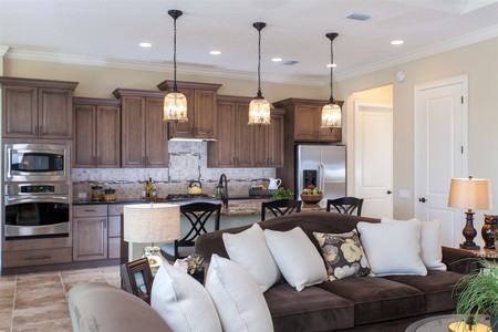 Subtle but striking tile adorn the kitchen backsplash and perfectly set-off the granite counders 