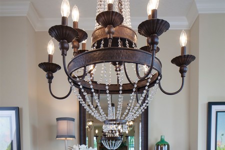 Exquisite details such as the dining room chandelier can be found throughout the home