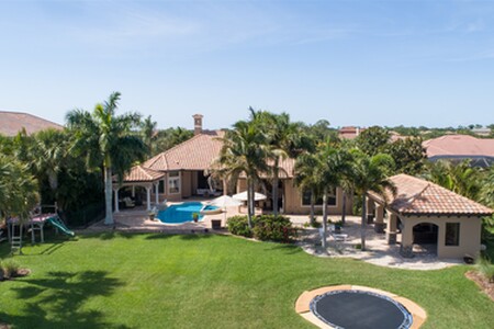 Aerial after Pergola is added to the right of the pool and cabana added to grass area on right side of property