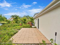 6986 Hammock Lakes Drive