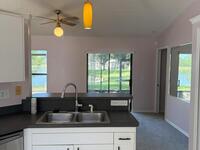 7186 Hammock Lakes Drive